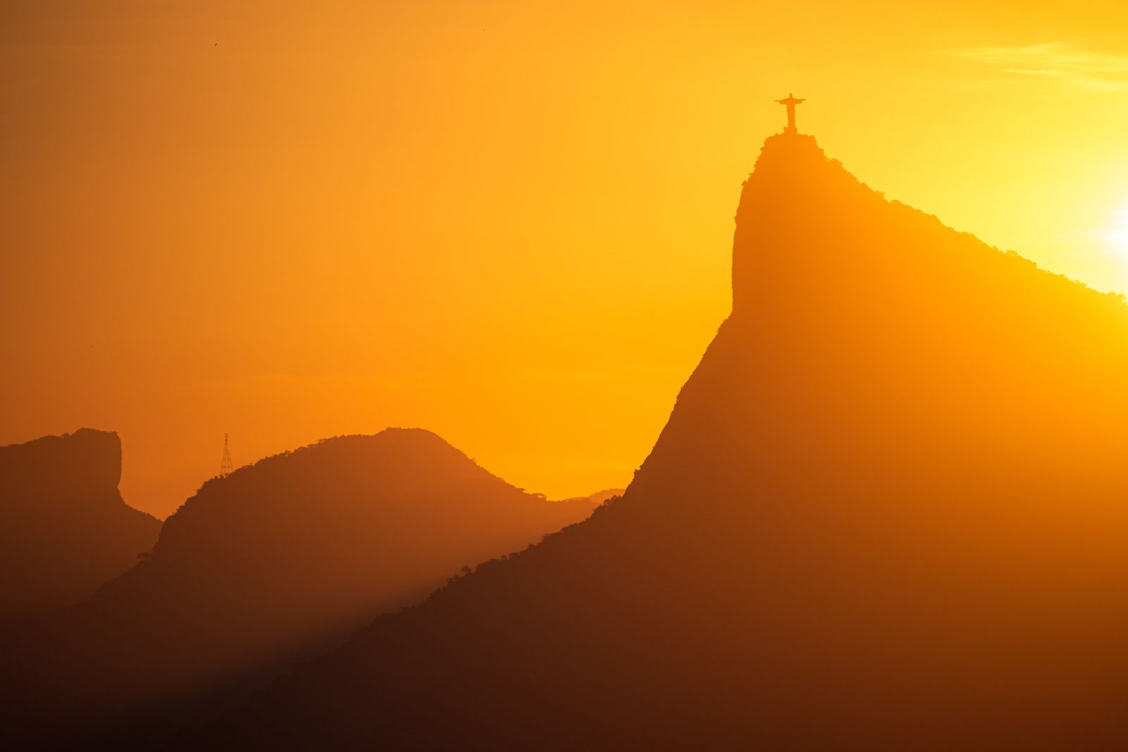 A golden sunset over the hills of Rio de Janeiro