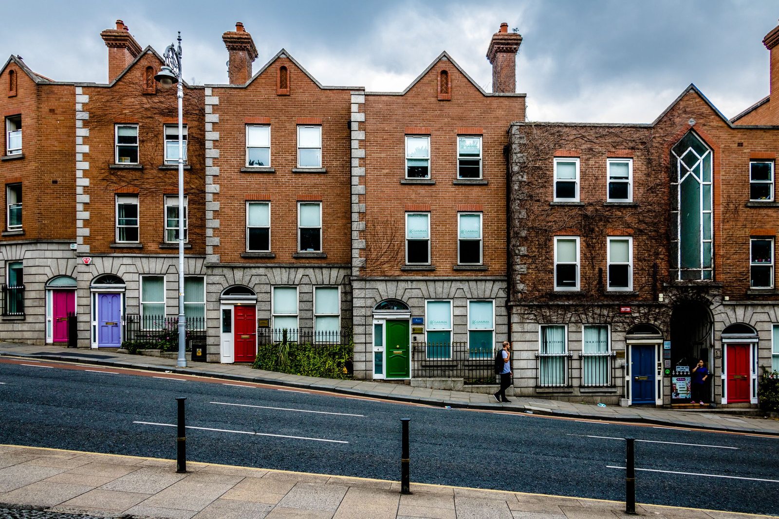 A row of colorful Georgian buildings on a Dublin street